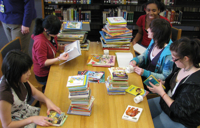 People working with books